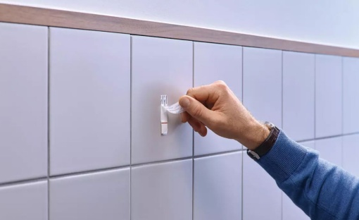 Prego adesivo ajustável TESA Powerstrips 2kg para azulejo e metal - 2 unidades