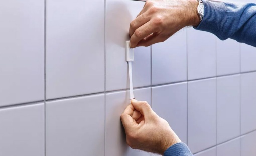 Prego adesivo ajustável TESA Powerstrips 2kg para azulejo e metal - 2 unidades