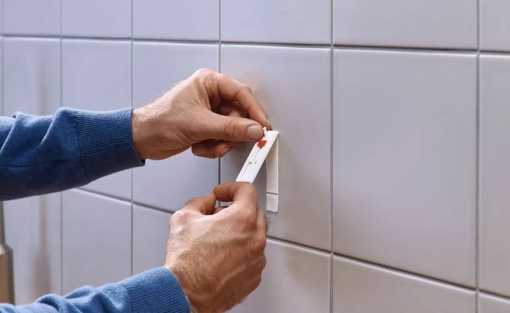 Prego adesivo ajustável TESA Powerstrips 3kg para azulejo e metal - 2 unidades