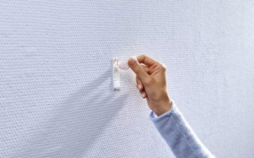 Prego adesivo TESA Powerstrips 0,5kg para parede pintada e estuque - 2 unidades