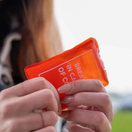 Hand warmer with "Break in Case of Cold" design.